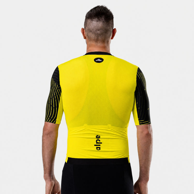 Moški kolesarski dres Flow fluo-rumen – pogled od zadaj