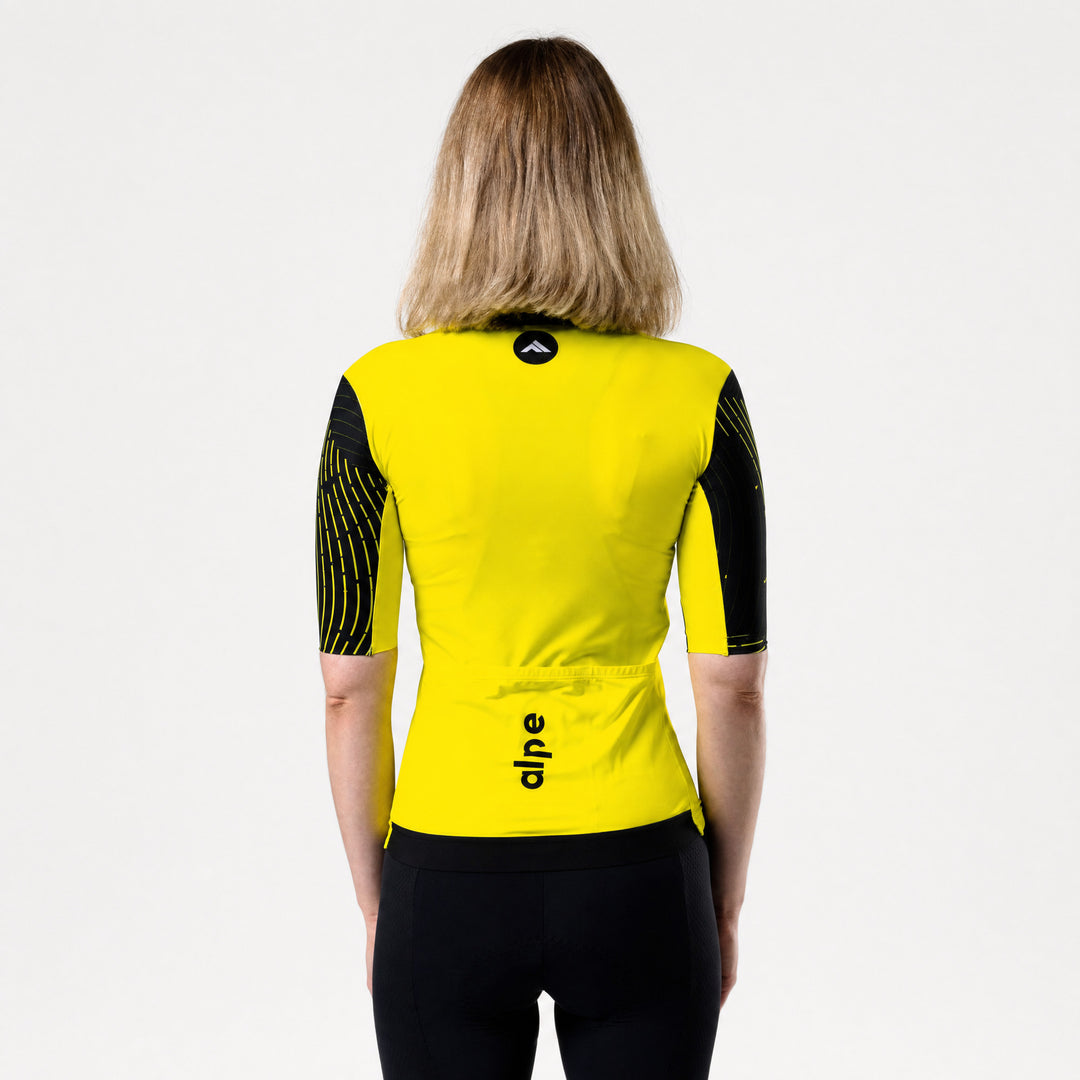 Ženski kolesarski dres Flow fluo-rumen – pogled od zadaj
